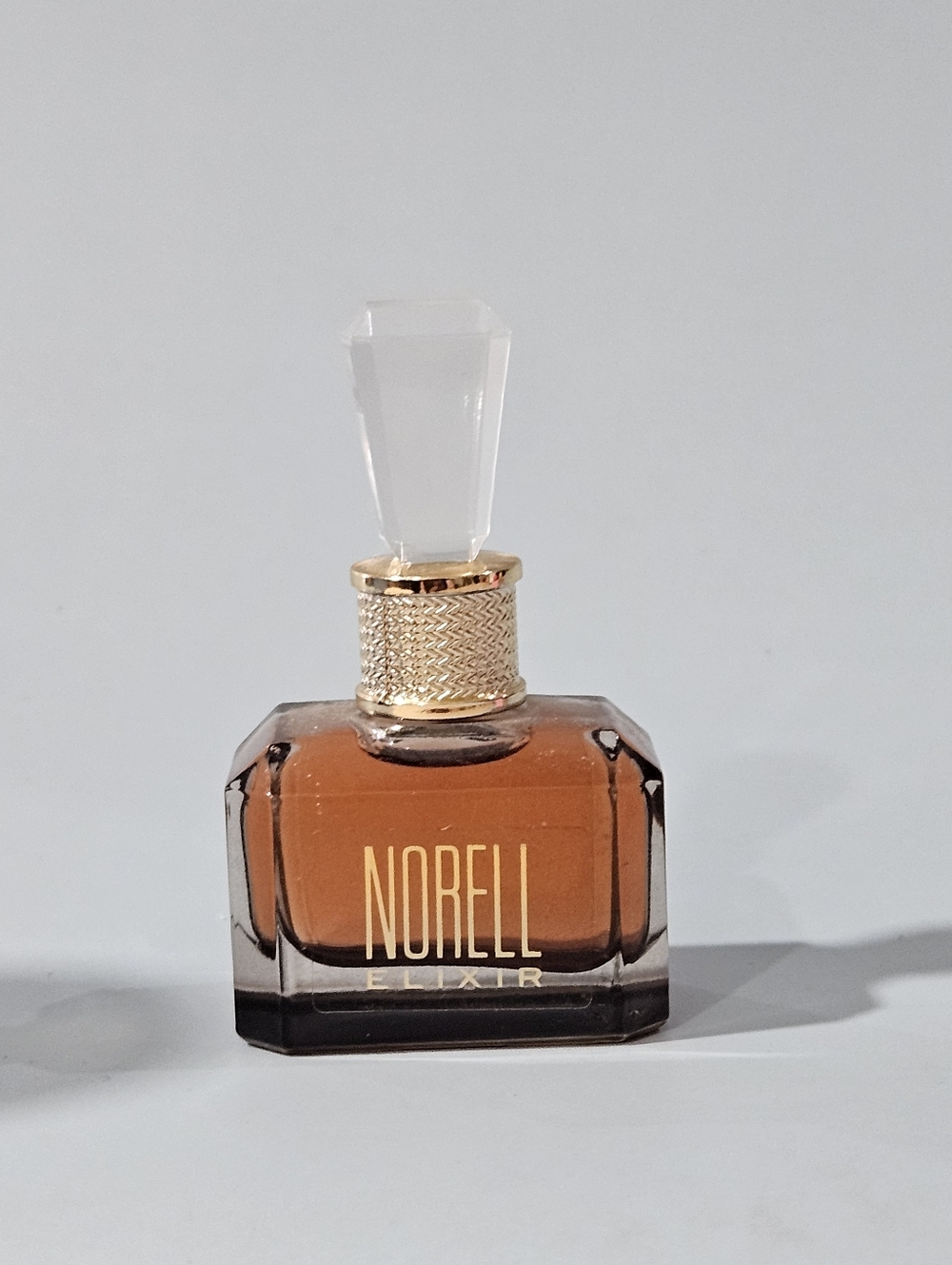 Norell Elixir. 0.17 Fl Oz Small Bottle